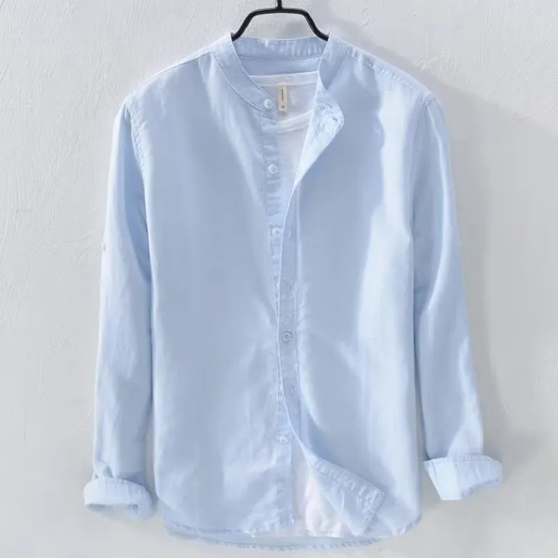 A loose-fit long sleeve casual shirt in a cotton linen blend, shown in a solid colour.
