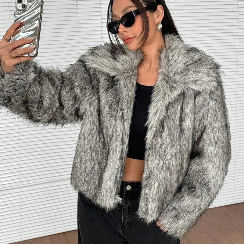 Artificial fur coat with fur collar in short 40cm length showing thick fabric texture