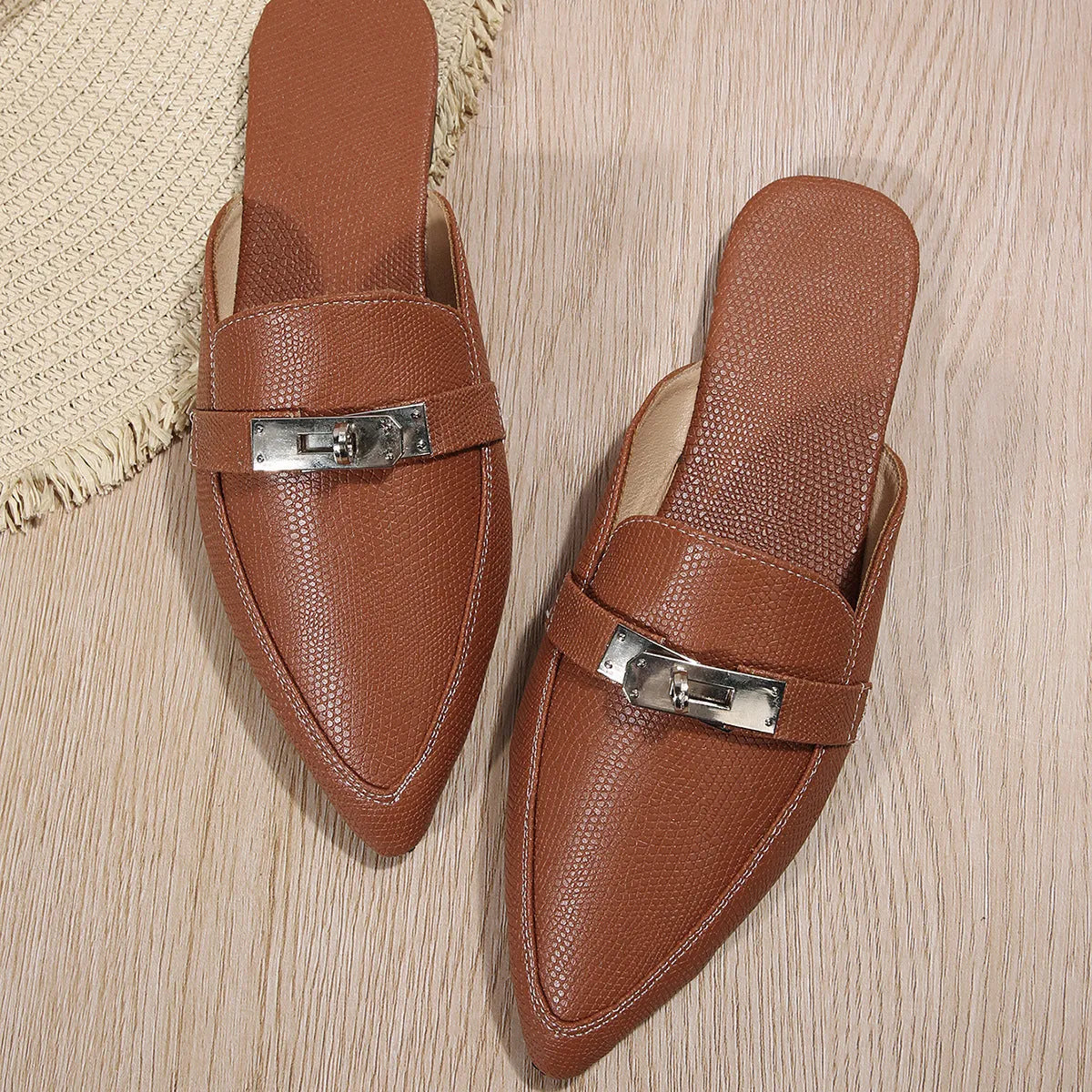 Light brown women's pointed-toe low heel casual slippers with PU upper and rubber sole.