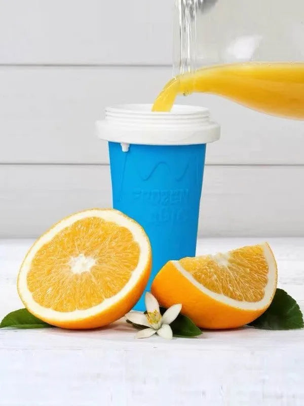 Blue quick cooling pinch cup with double-layer cylindrical design on a table.