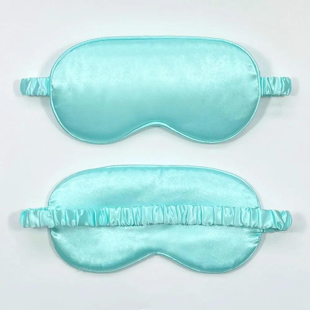 Double-sided rayon elastic satin sleep mask shown in multiple colour options including black, sky blue, and wine red.