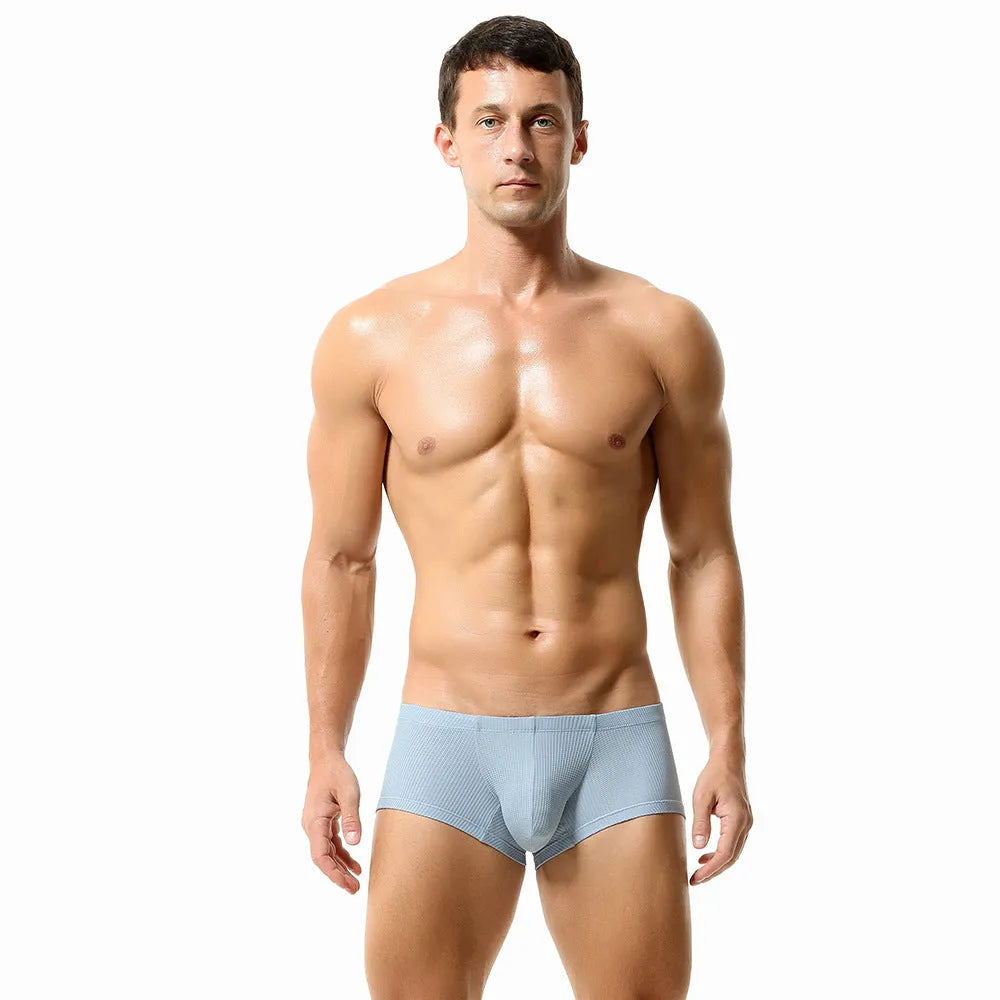 Men's low waist nylon boxers in solid colours including orange red and cloudy blue