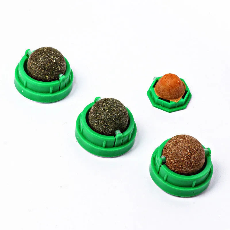 Plastic catnip ball toy in various colours for feline dental care and play