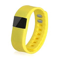 Colourful plastic bracelet pedometer showing step distance calorie tracking on wrist