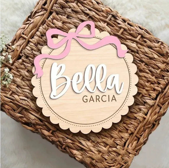 Square wooden baby room ornament personalised with a child's name in two available sizes.