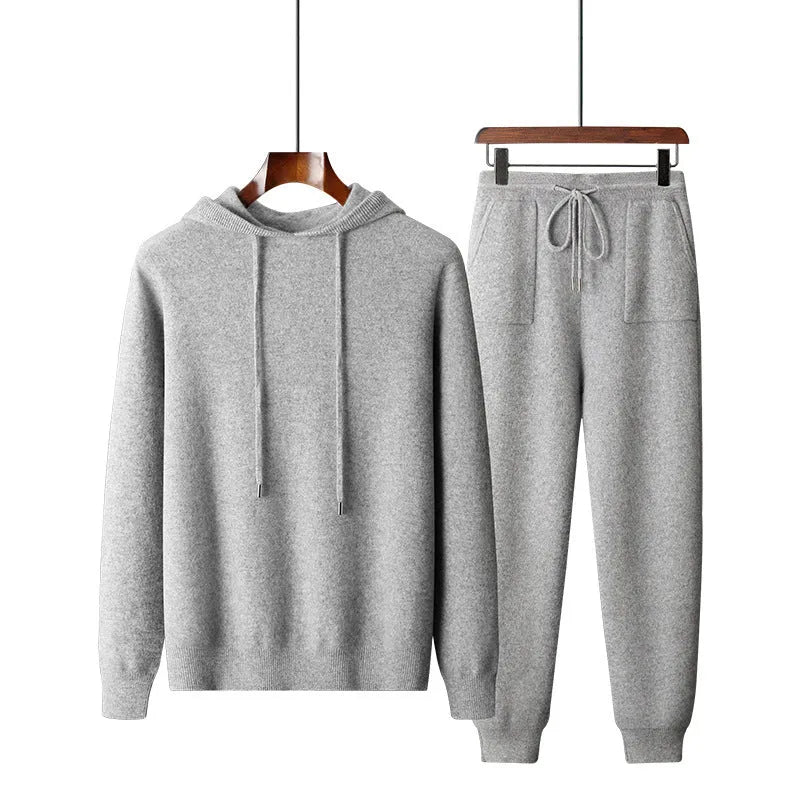 Men's light gray cashmere hooded sweatshirt and long pants set on a hanger.