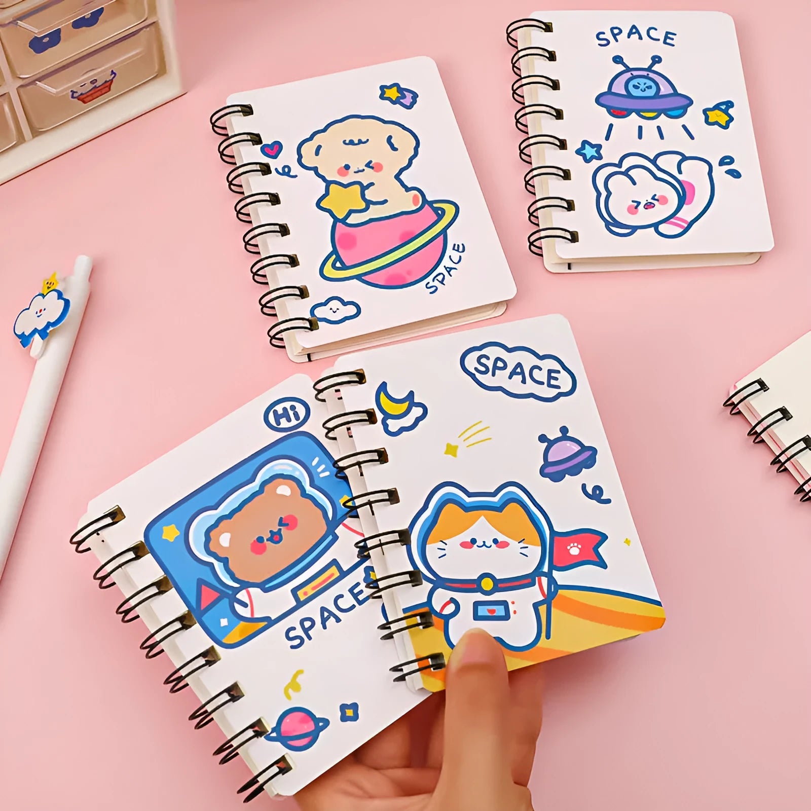 Astronaut series flippable pocket notebook showing cover design options and 10.5cm by 8cm size.