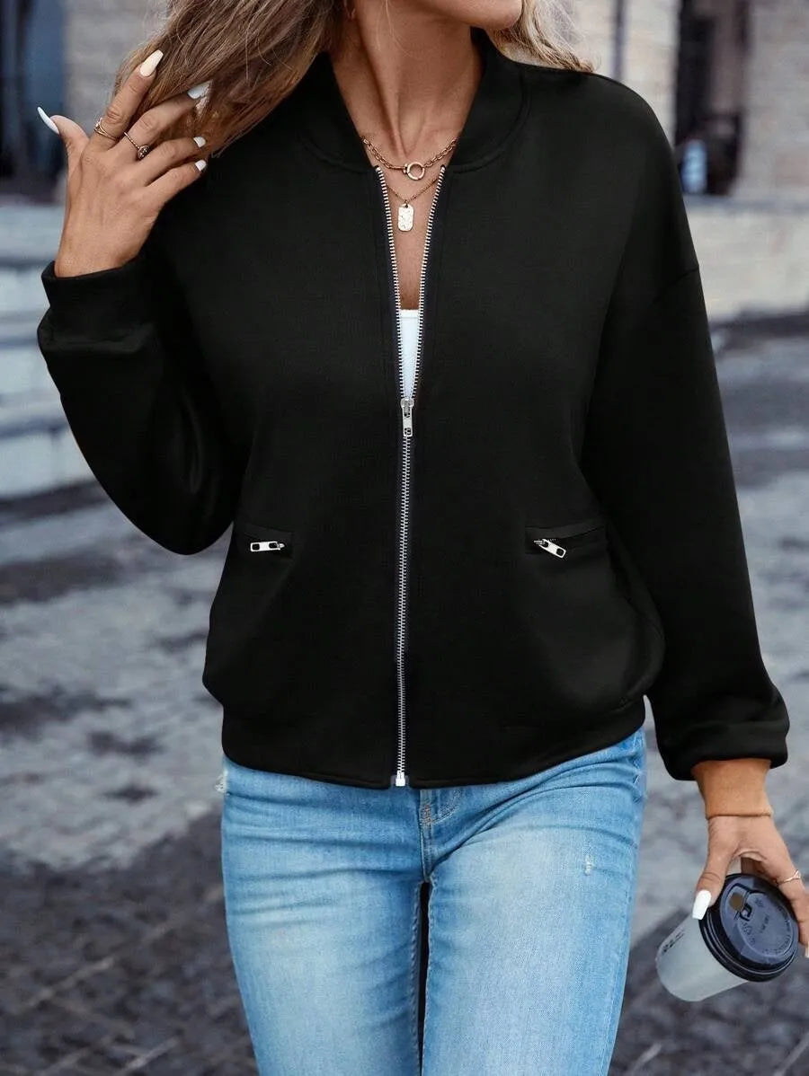Black women's casual zip jacket with long sleeves and faux pocket detail