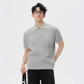 Men's summer business casual sweater with contrast lapels, short sleeves, solid colour, polyester blend, available in black.