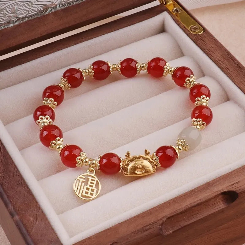 Women's glazed bracelet with floral ice crack pattern and zodiac animal modelling in electroplated finish