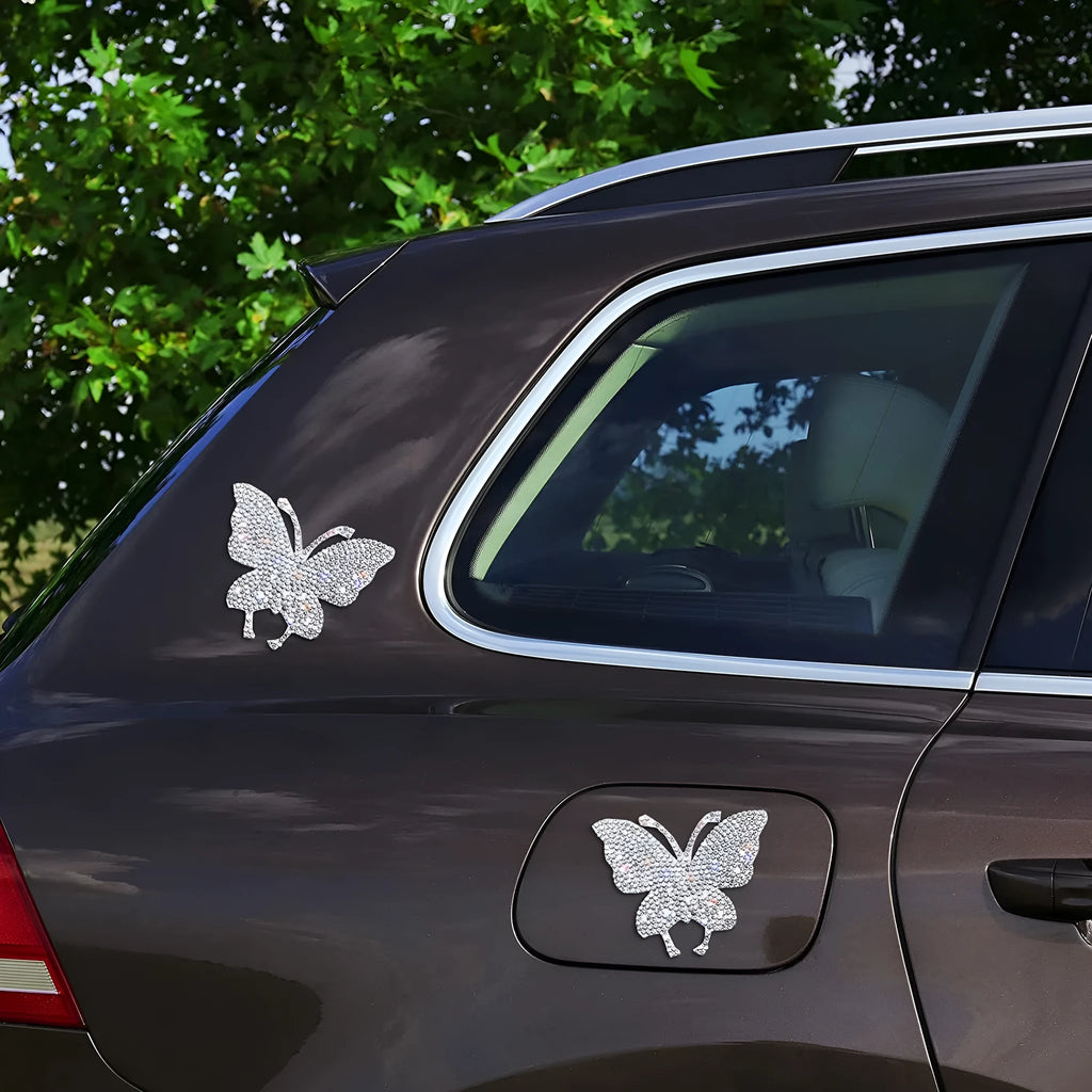 White diamond glass car sticker with butterfly and bear claw design, 7cm by 6cm.