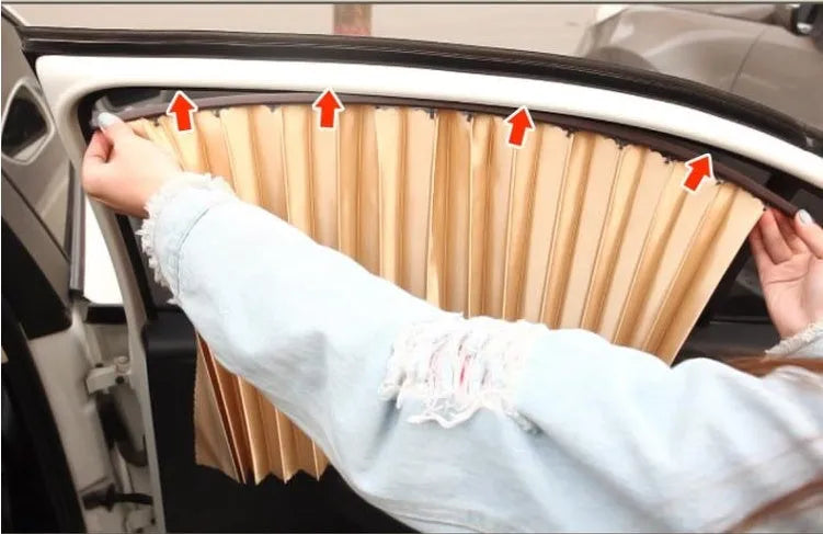Magnetic car curtain sun shade in black attached to vehicle side window