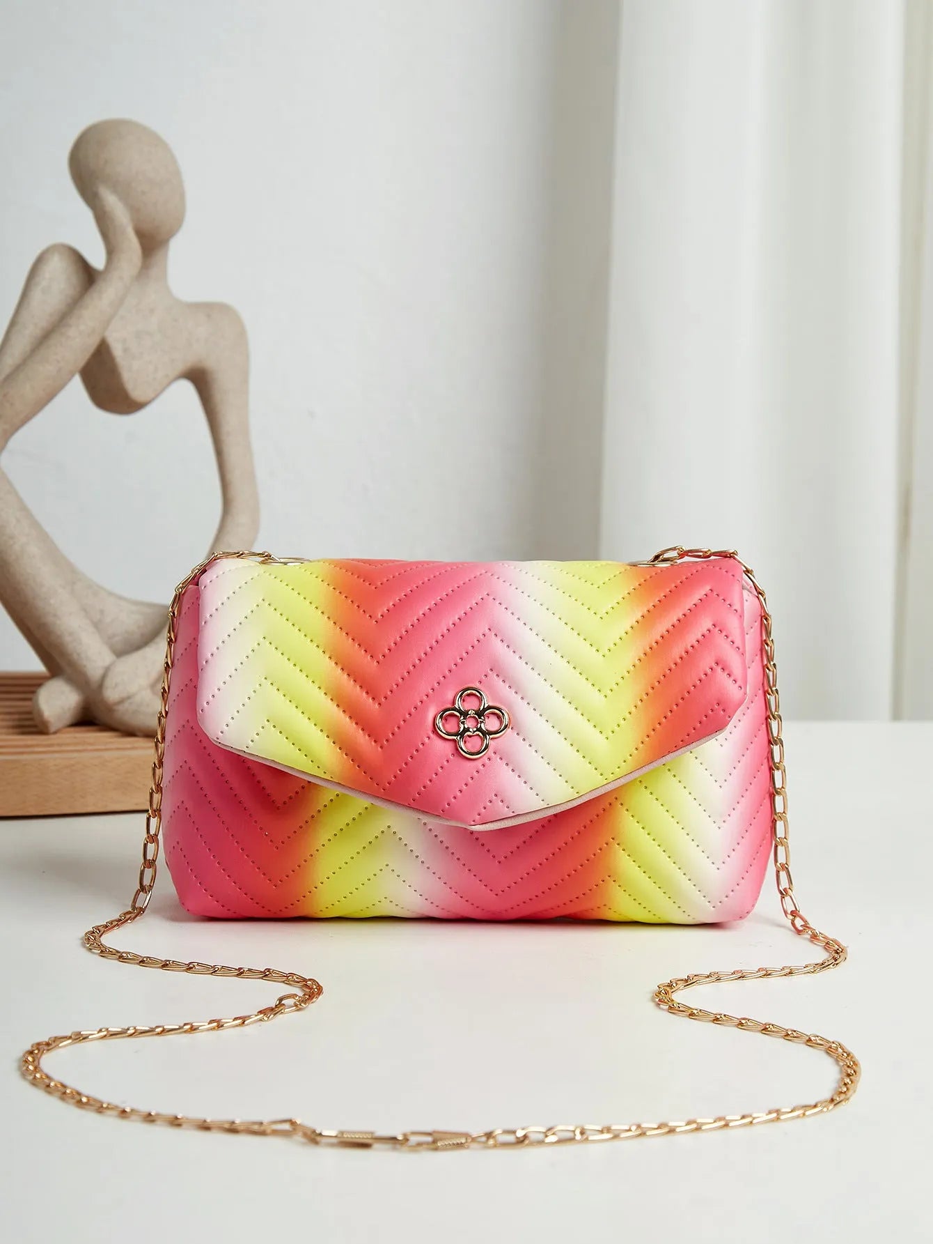 Soft PU clamshell bag with contrast colour pattern and single shoulder strap