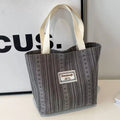 Japanese style corduroy shoulder tote handbag in dark brown colour showing textured fabric and large capacity design