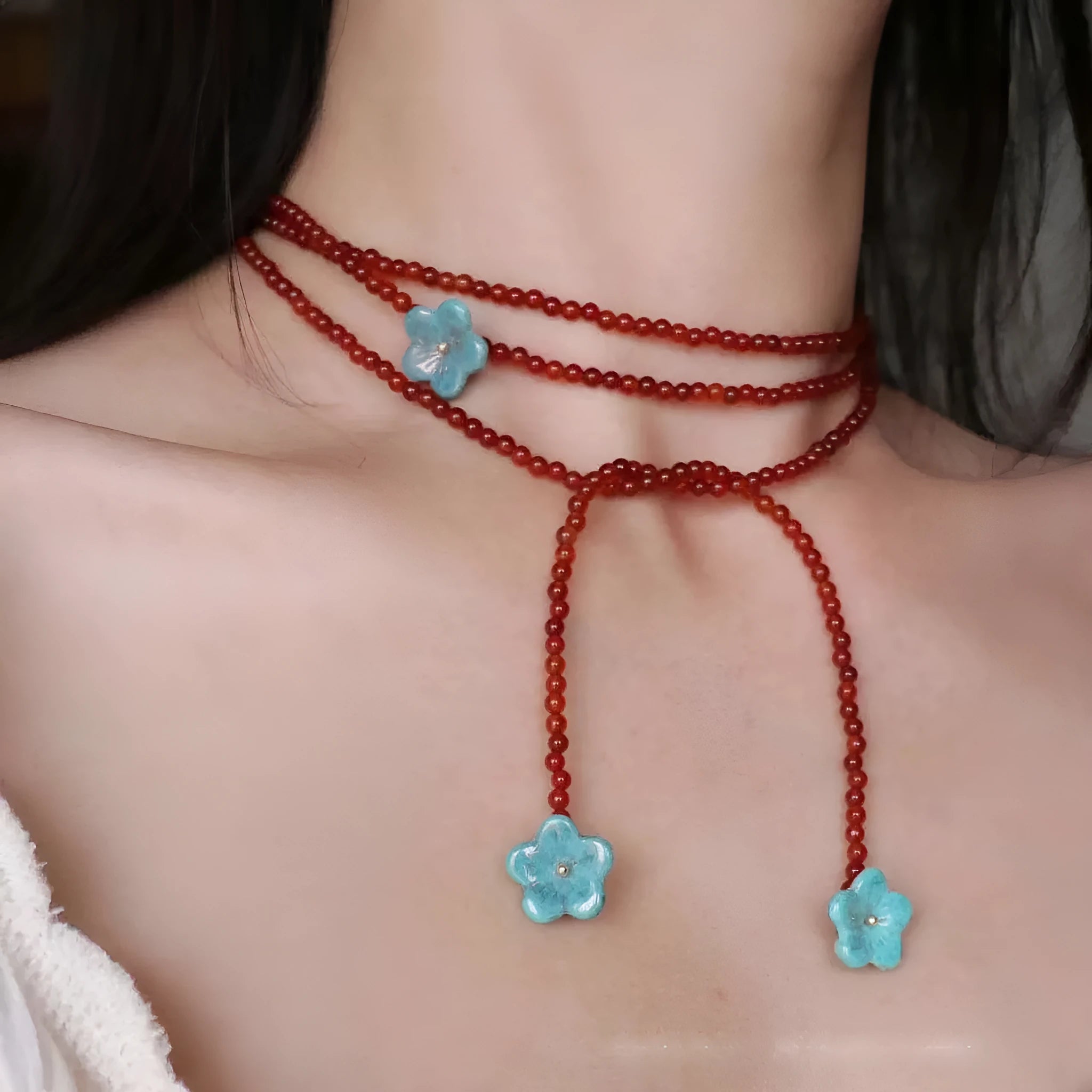 Red agate and acrylic geometric beaded necklace on a woman, adjustable chain 31-40cm