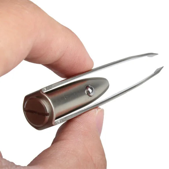 Stainless steel LED lighted tweezer with push-button switch for eyebrow grooming, measuring 83mm in length