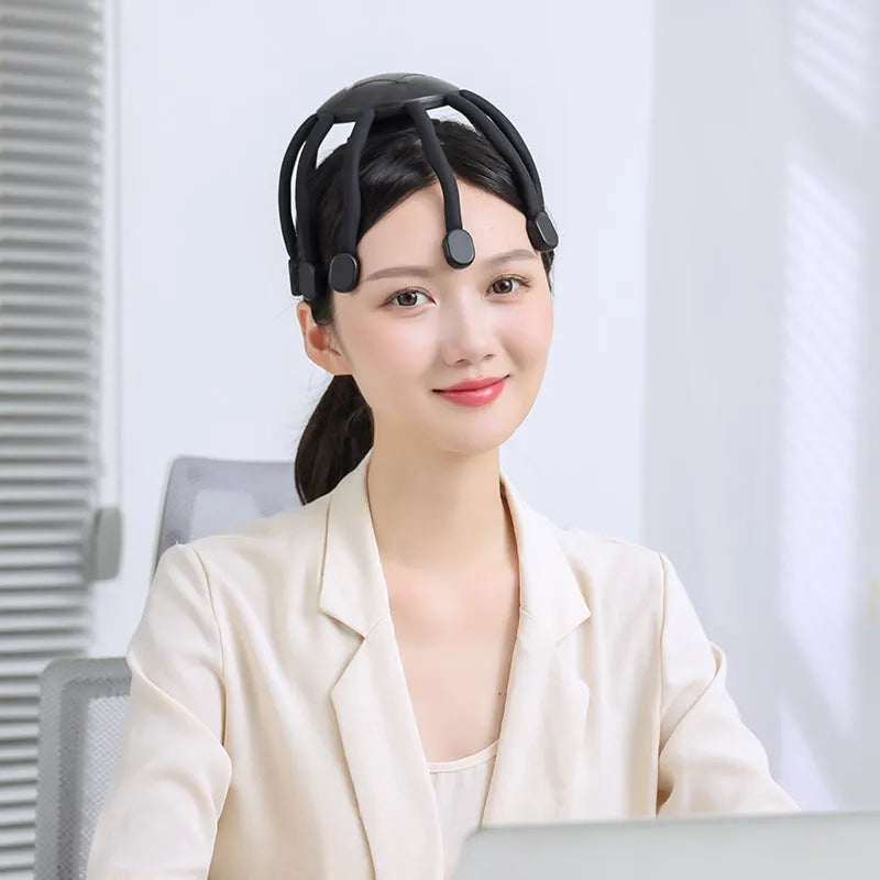 Black electric head massager with multiple claws for scalp vibration and USB charging cable