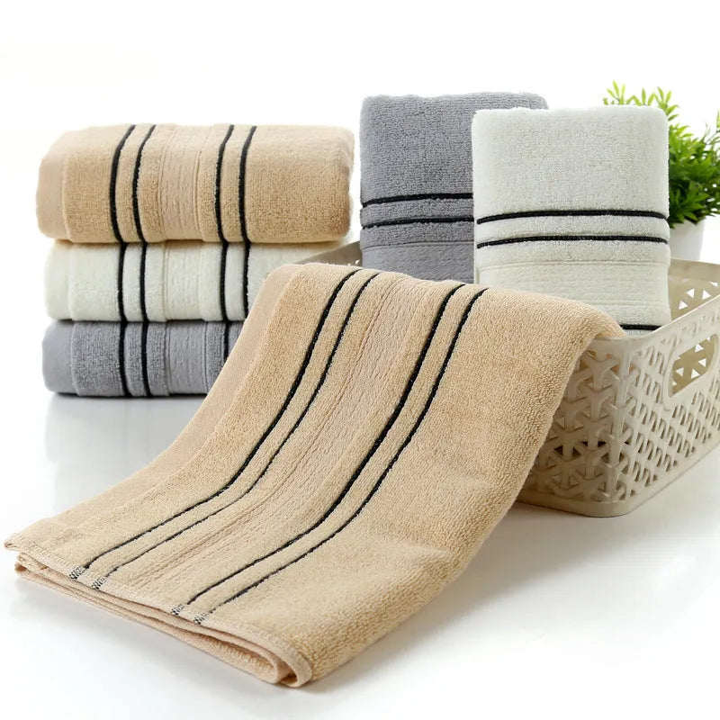 100% cotton towel set with white bath towel 70x140cm and face towel 34x74cm on bathroom rail