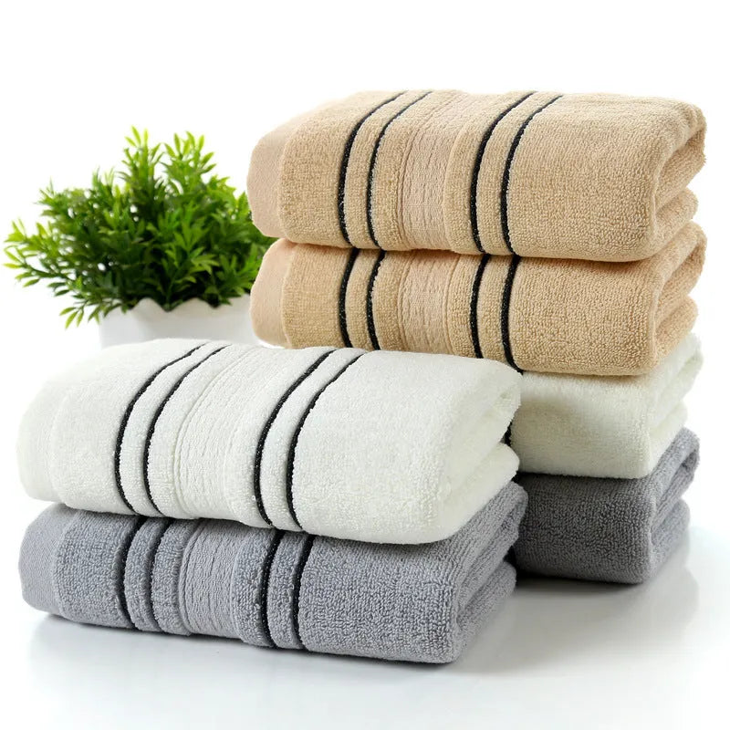 100% cotton towel set with white bath towel 70x140cm and face towel 34x74cm on bathroom rail