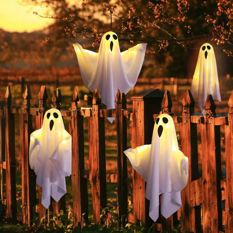 Halloween ghost lamp with luminous cloth ghosts in white and orange colours for indoor horror lighting