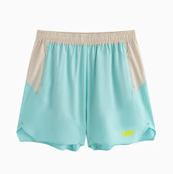 Man's loose grey workout shorts with elastic waist and lace-up fly for gym training