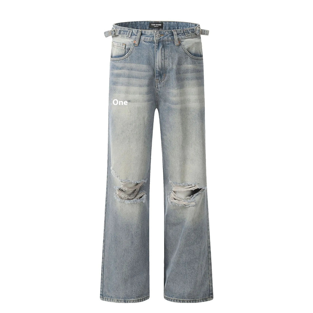 Men's blue distressed straight-leg retro jeans with a zip fly on a plain background.
