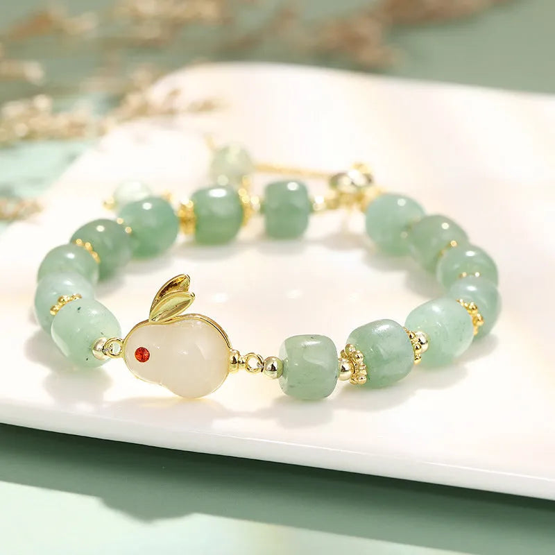 Rabbit bracelet with green aventurine and strawberry quartz beads, copper plating and gold accents