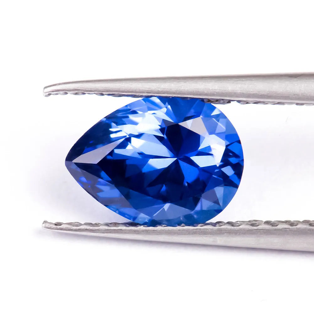 Royal blue heart-shaped tiara cut cubic zirconia loose gemstone on white background