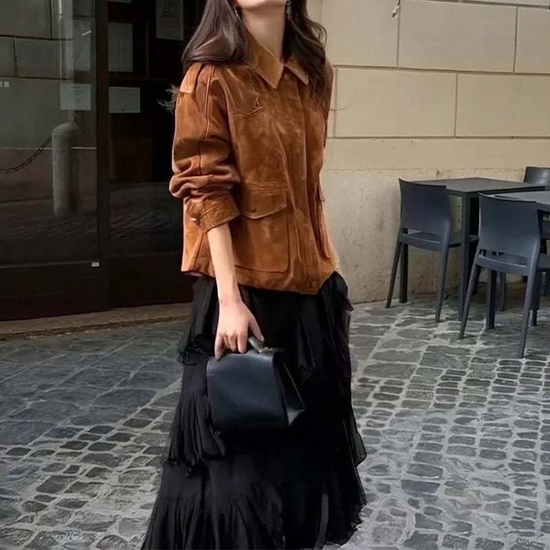 Women's brown suede-effect polyester coat with regular sleeves on a hanger