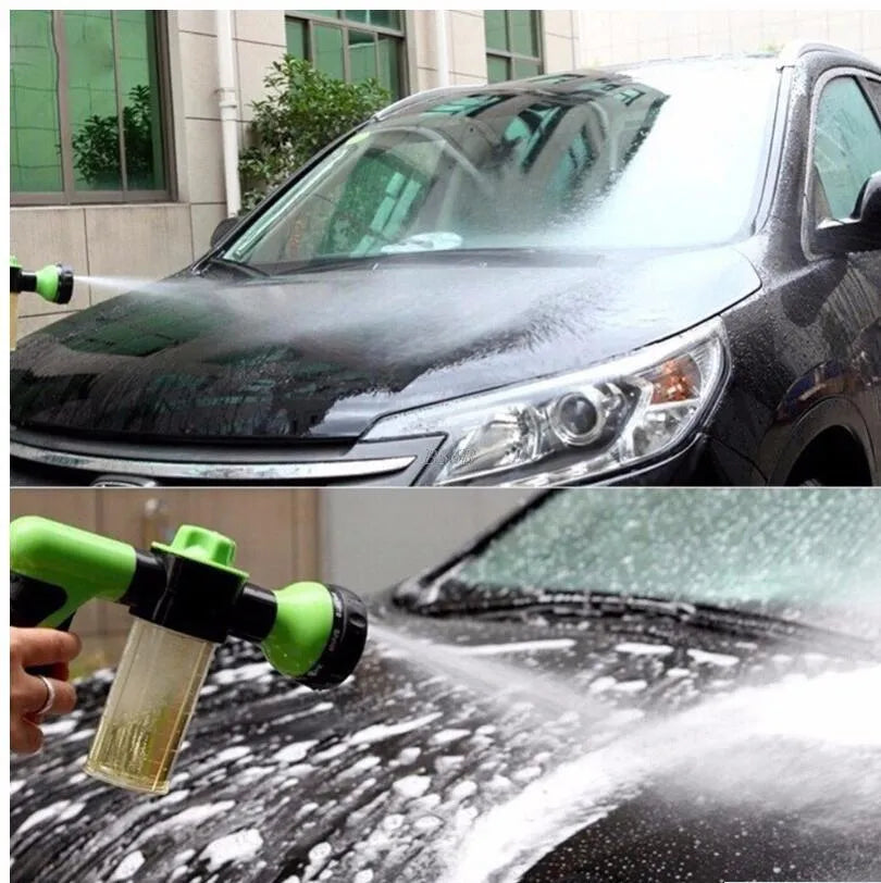 Green high-pressure foam spray gun with adjustable nozzle and attached water pipe for car and garden cleaning.
