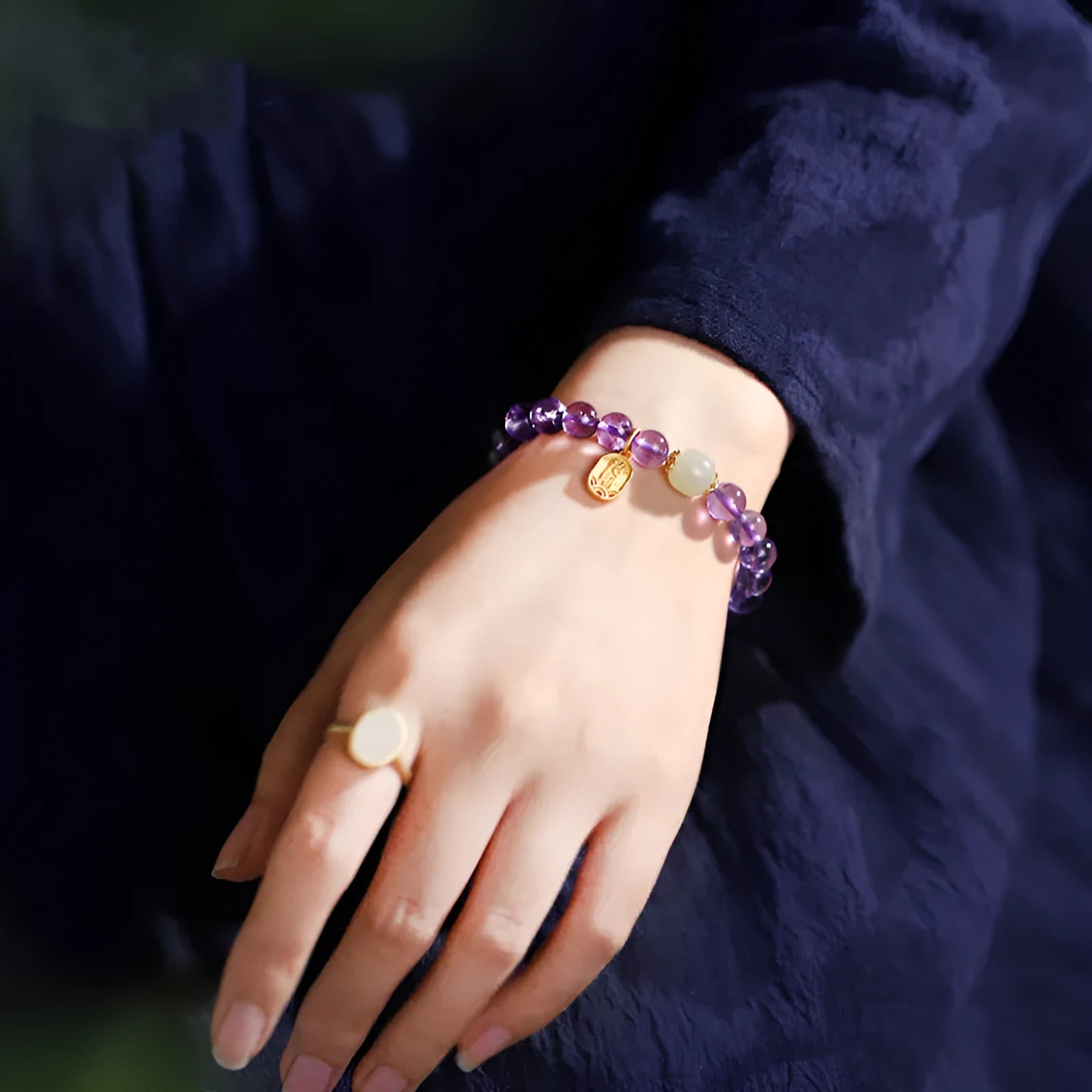 Amethyst crystal bead bracelet with geometric shape and national style design.