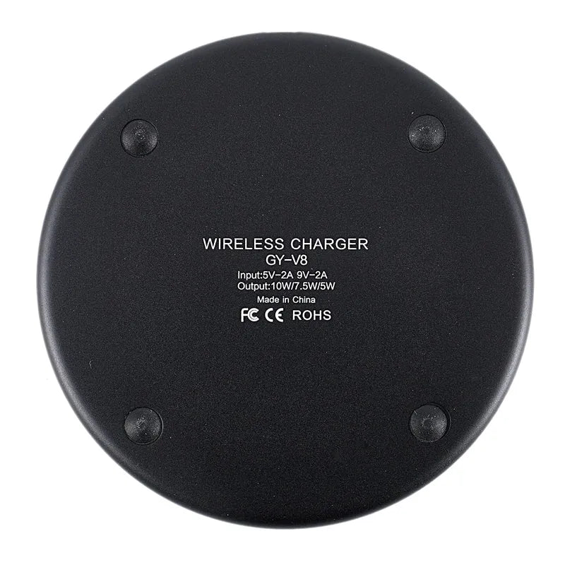 Magic array wireless charger in black with light indicator on desk showing 10W fast charge