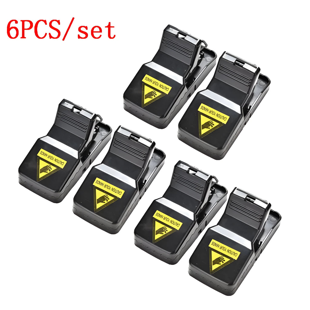 Six black plastic snapping mousetraps with measurements 11cm long by 5.5cm high