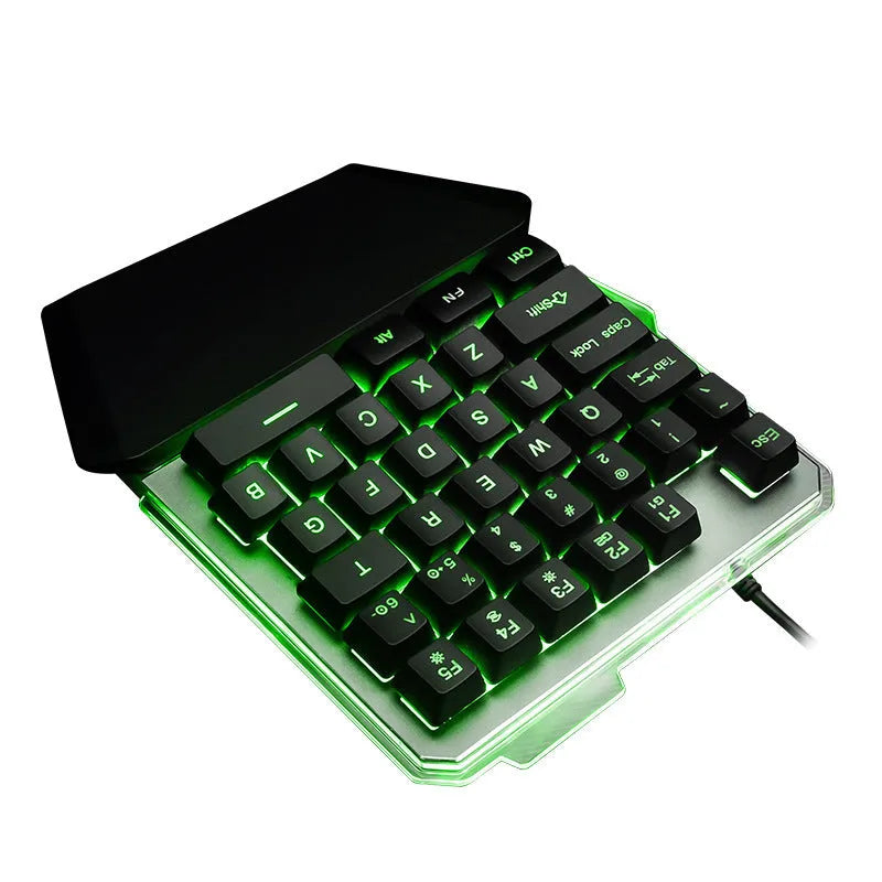 Black G40 Flow one-handed mechanical gaming keyboard with RGB backlit keys on a desk.