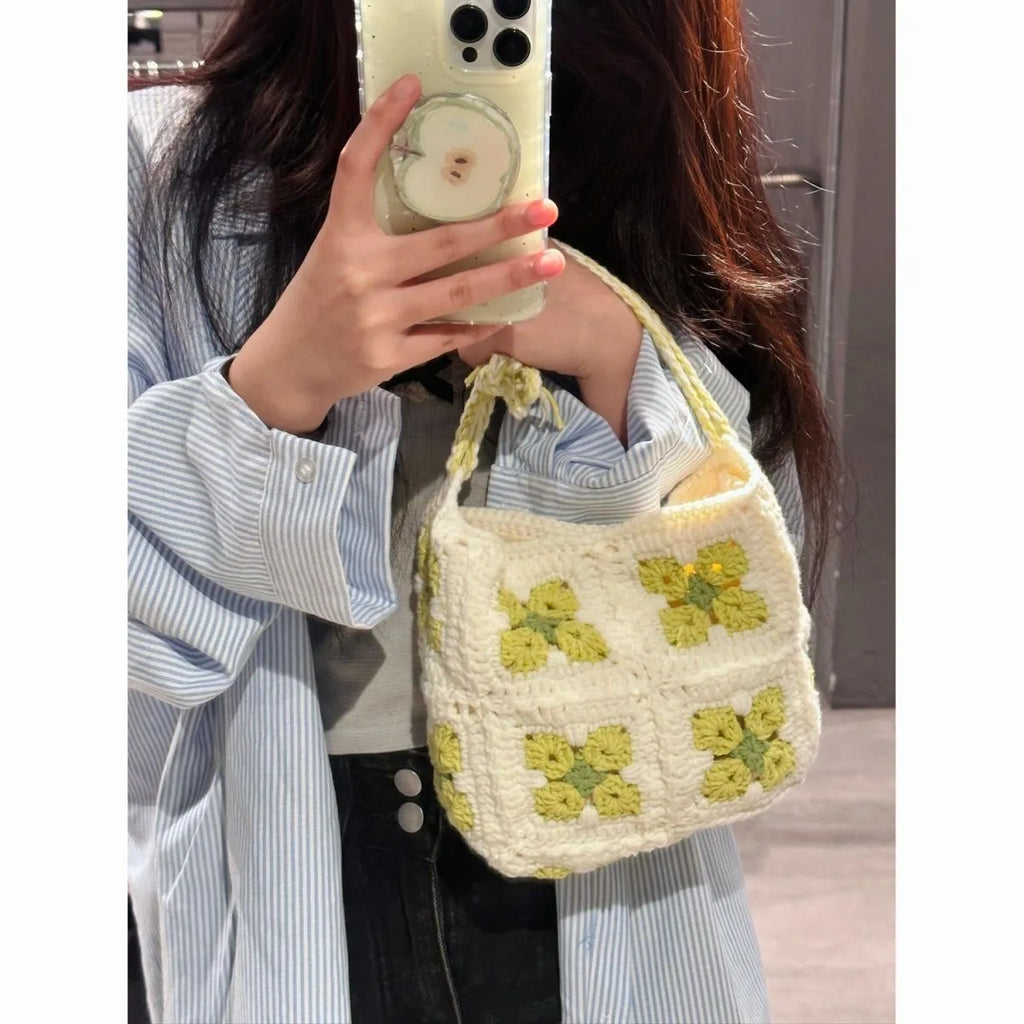 Handmade crochet cherry blossom handbag with magnetic buckle closure in cotton yarn