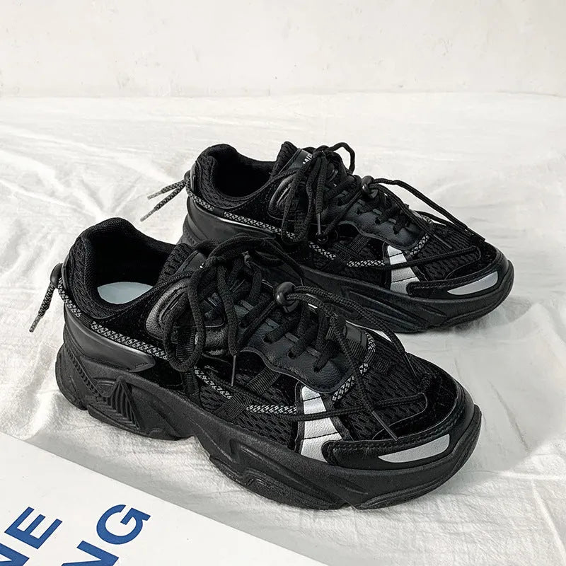 Men's white platform dad shoes in Korean style with front lace-up and mesh lining.