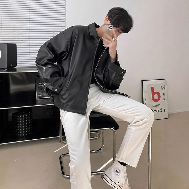 Men's black leather-style casual baseball jacket with loose fit and side seam pockets