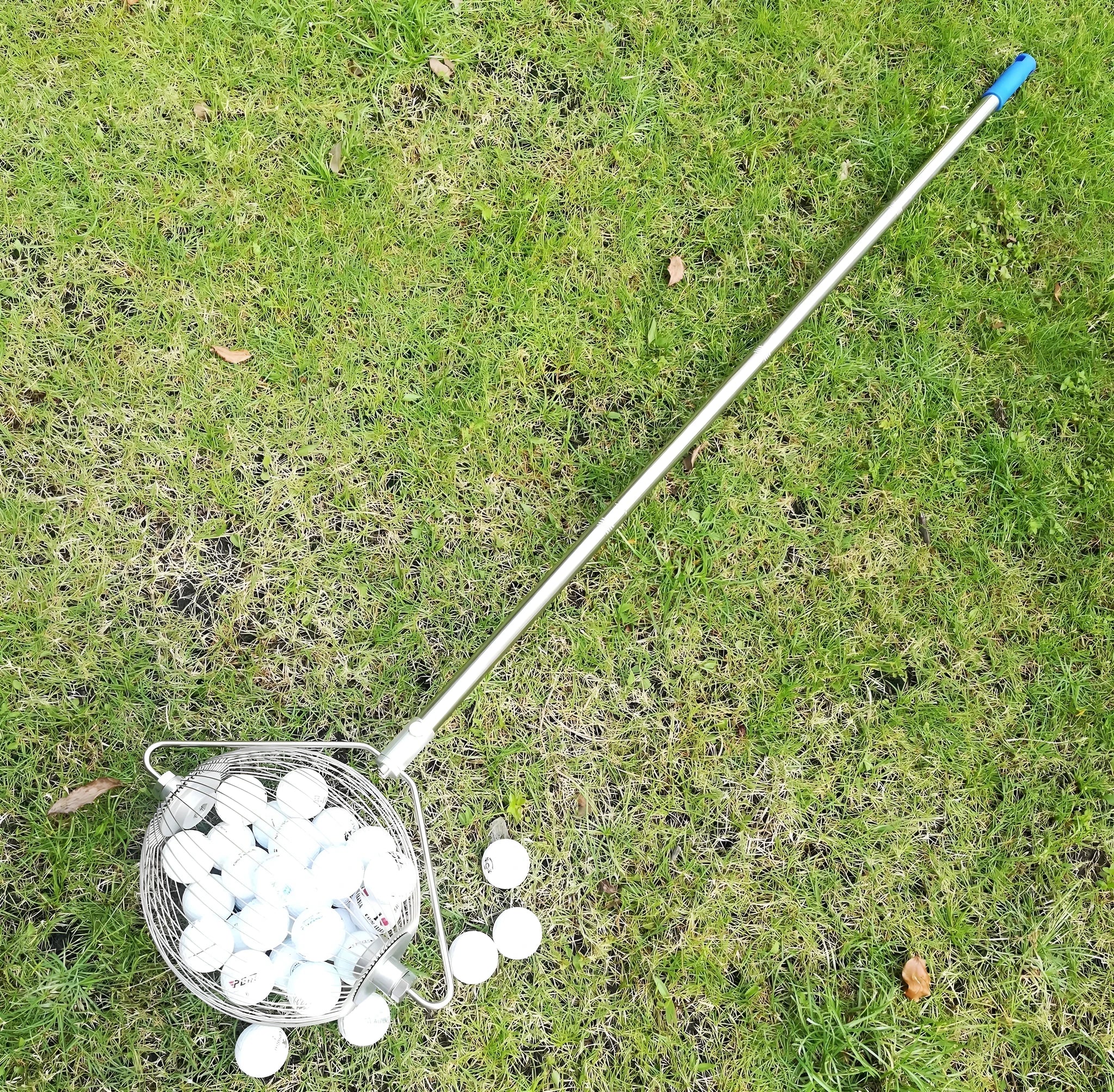Handheld stainless steel golf ball picker retriever tool in metal colour.