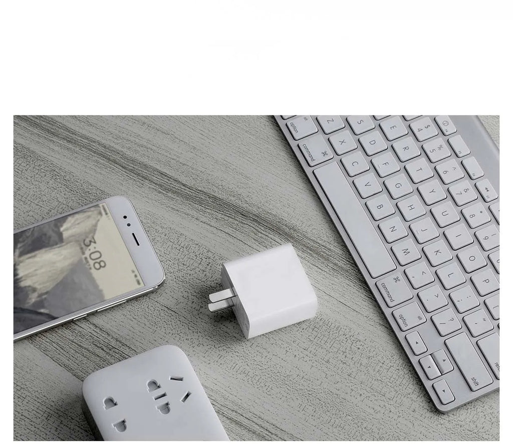Xiaomi 30W USB charger, white, dual port USB-C and USB-A, compact 48mm x 28mm x 47mm