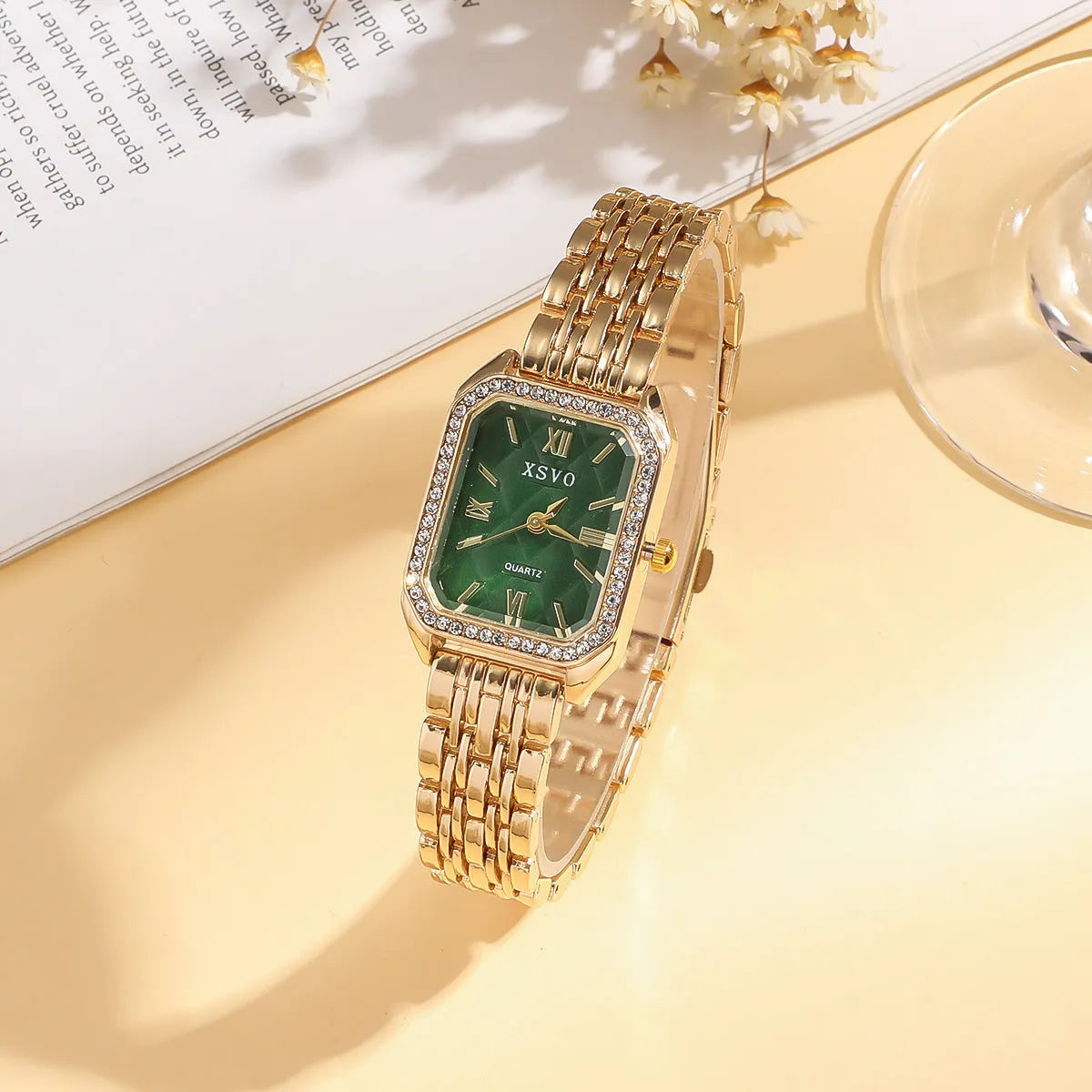 Gold green square steel watch with four matching alloy bracelets laid out as a complete gift set