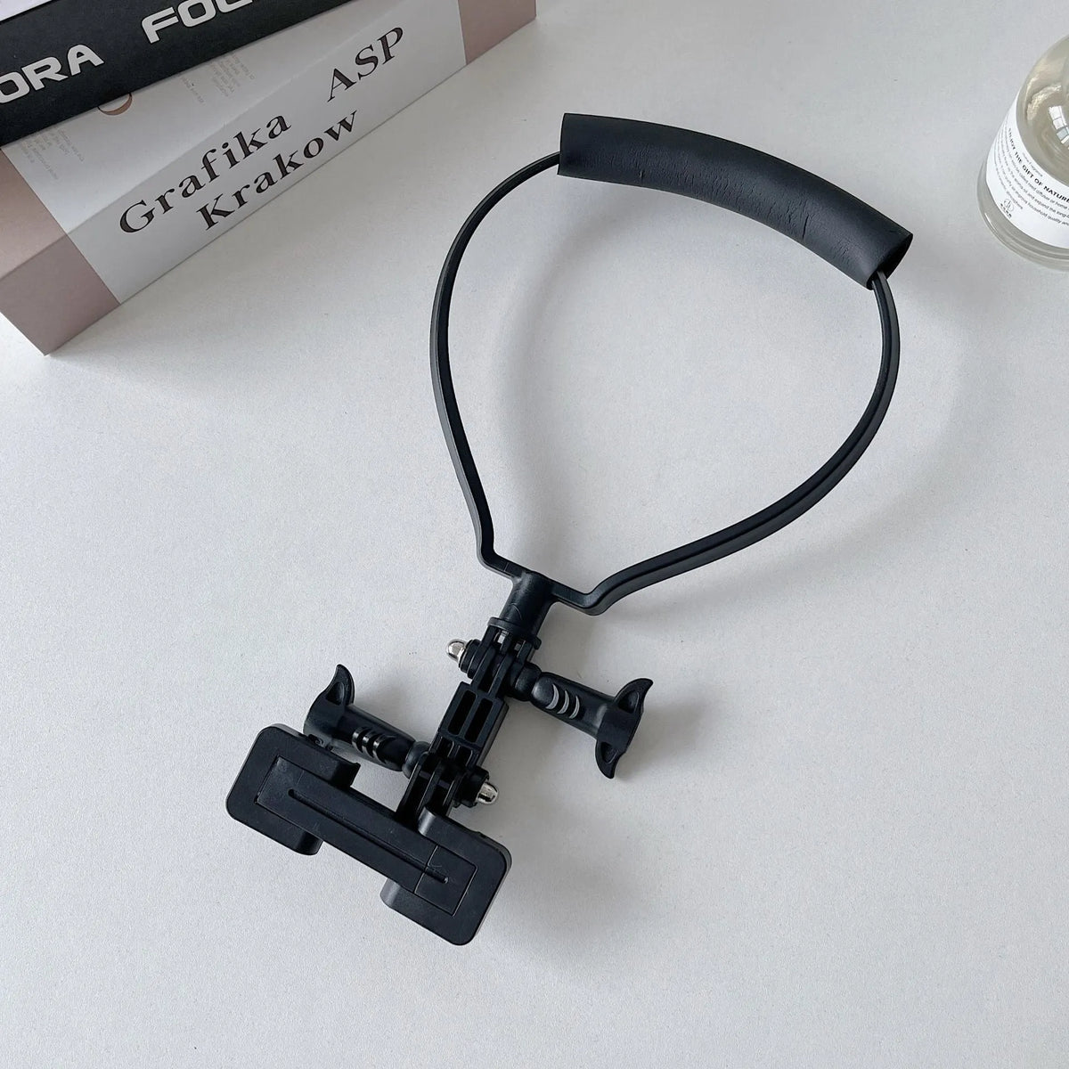 Black plastic universal cell phone neck hanging bracket with phone clip and anti-slip cushion