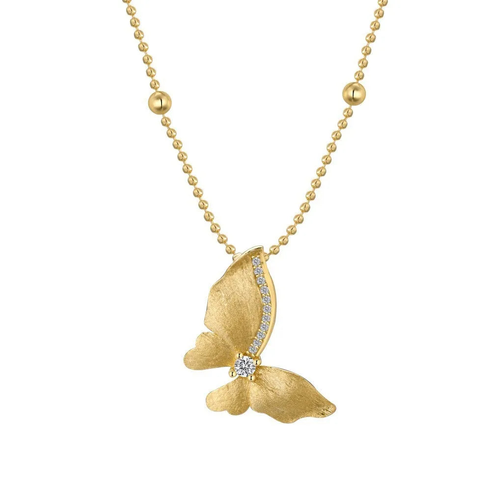 Gold-tone 925 silver butterfly necklace with frosted antique-style pendant on a clavicle chain