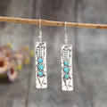 Silver geometric earrings with turquoise inlay on long strip design, retro style women's jewellery