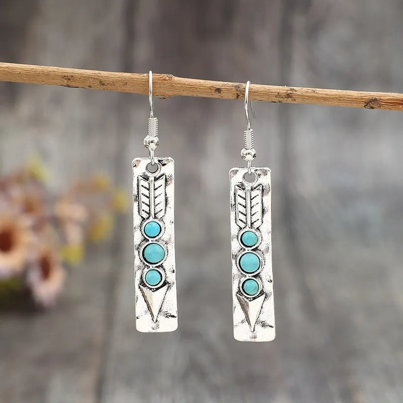 Silver geometric earrings with turquoise inlay on long strip design, retro style women's jewellery