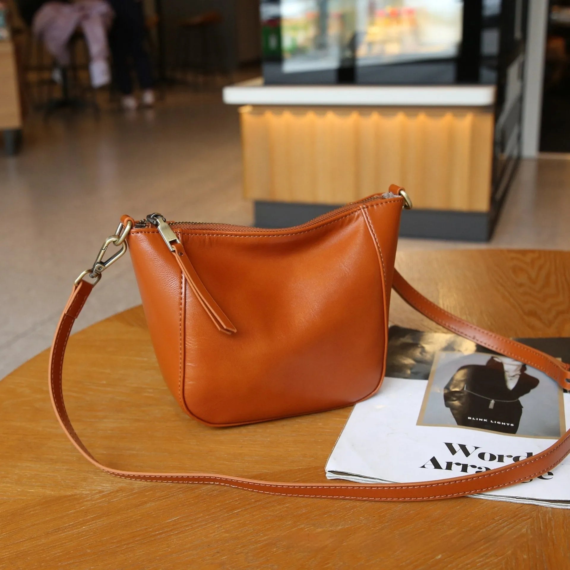 Ladies' top-grain leather handbag in vertical square shape with single strap, 18cm tall, in milk apricot colour