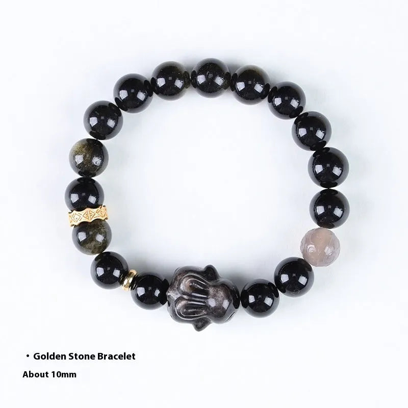 Handmade lying rabbit obsidian bracelet with Jin Yaoshi and brass beads, available in 8mm and 10mm sizes.