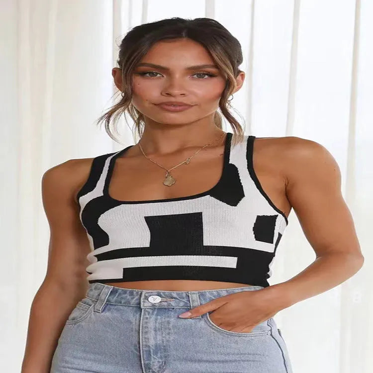 Women's slim fit camisole vest with U collar and exposed navel design in stretch polyester fabric.