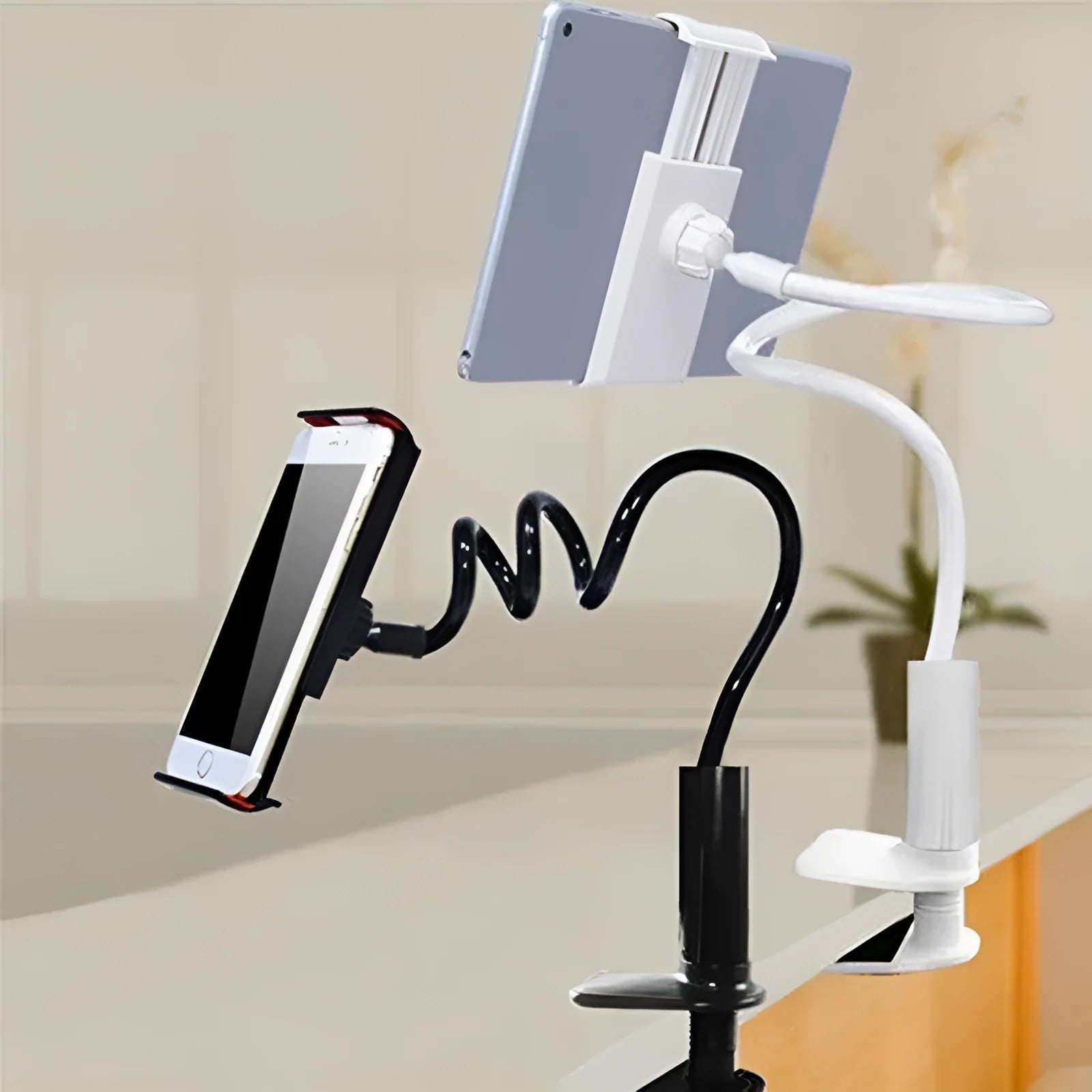 Black flexible tablet mount holder with bendable arm and suction base shown holding a smartphone