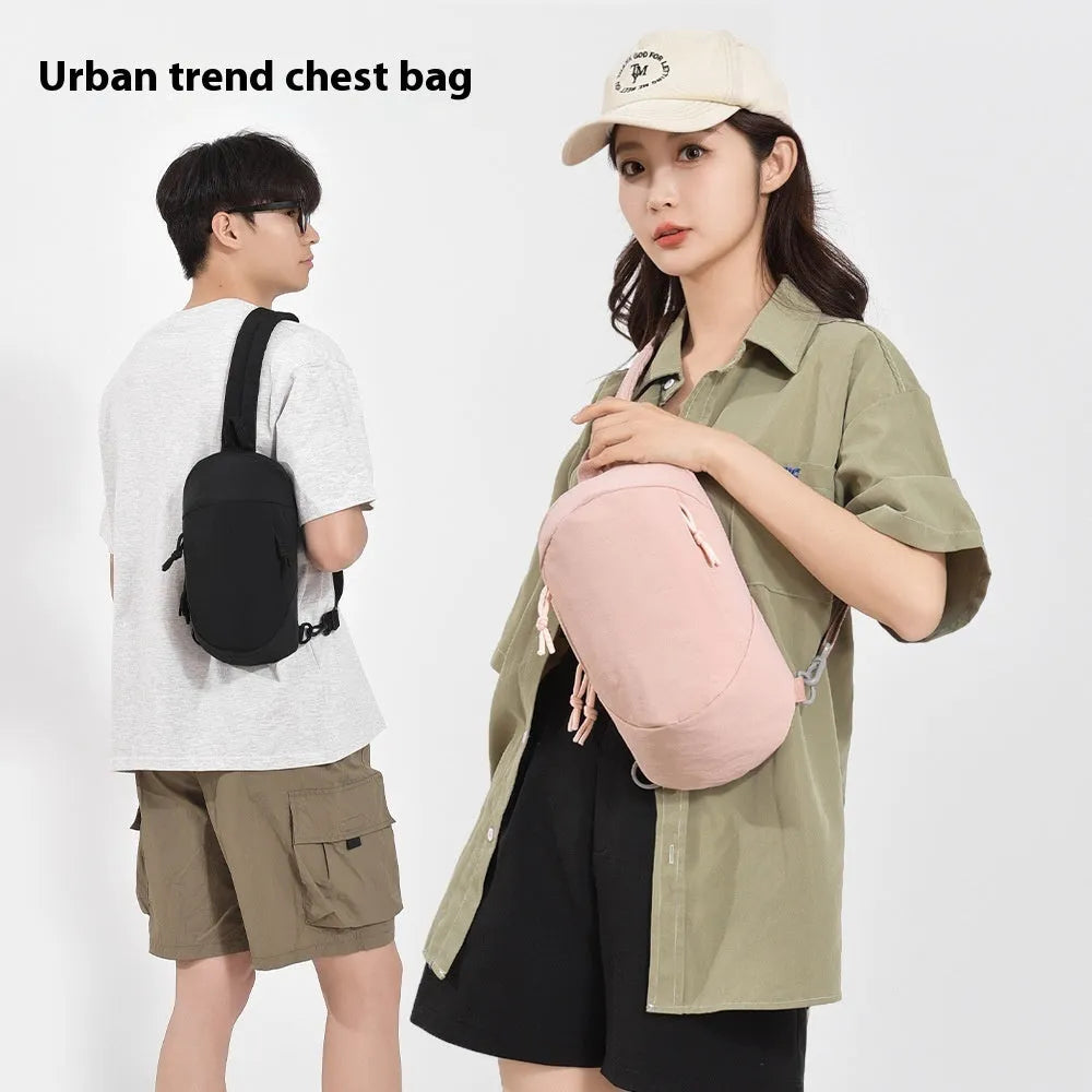 Outdoor girls crossbody bag in nylon, shown in army green with a mobile phone pocket.
