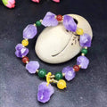 Natural shaped purple amethyst bead bracelet for women featuring a Fu character design element.